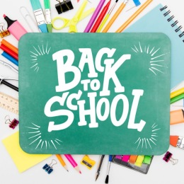 font reading back to school with pencils behind it