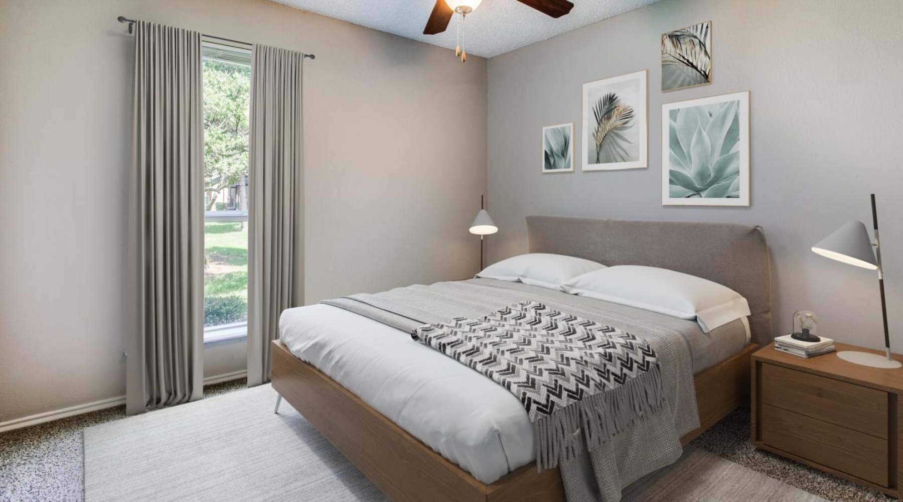 a bedroom with a fan and a window